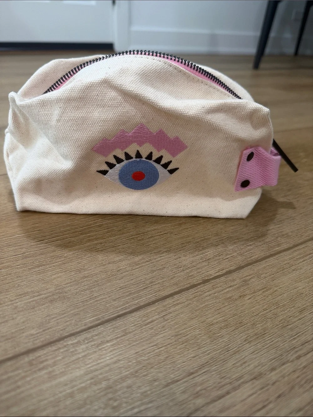 Benefit Beige Canvas Pencil Pouch with Pink Handle and Eye Motif